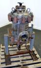 Used American Heat Reclaiming Vertical Spiral Heat Exchanger, Type 1-V, 30 Square Feet. 304 Stainless steel. Hot and cold side rated 75 psi at -20 to 1250 degrees F. Removable heads. Inner pass cross...