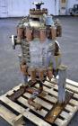 Used American Heat Reclaiming Vertical Spiral Heat Exchanger, Type 1-V, 30 Square Feet. 304 Stainless steel. Hot and cold side rated 75 psi at -20 to 1250 degrees F. Removable heads. Inner pass cross...