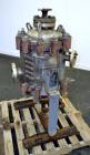 Used American Heat Reclaiming Vertical Spiral Heat Exchanger, Type 1-V, 30 Square Feet. 304 Stainless steel. Hot and cold side rated 75 psi at -20 to 1250 degrees F. Removable heads. Inner pass cross...
