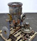 Used American Heat Reclaiming Vertical Spiral Heat Exchanger, Type 1-V, 30 Square Feet. 304 Stainless steel. Hot and cold side rated 75 psi at -20 to 1250 degrees F. Removable heads. Inner pass cross...