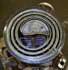 Used American Heat Reclaiming Vertical Spiral Heat Exchanger, Type 1-V, 30 Square Feet. 304 Stainless steel. Hot and cold side rated 75 psi at -20 to 1250 degrees F. Removable heads. Inner pass cross...
