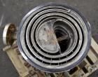 Used American Heat Reclaiming Vertical Spiral Heat Exchanger, Type 1-V, 30 Square Feet. 304 Stainless steel. Hot and cold side rated 75 psi at -20 to 1250 degrees F. Removable heads. Inner pass cross...