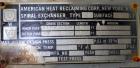 Used American Heat Reclaiming Vertical Spiral Heat Exchanger, Type 1-V, 30 Square Feet. 304 Stainless steel. Hot and cold side rated 75 psi at -20 to 1250 degrees F. Removable heads. Inner pass cross...