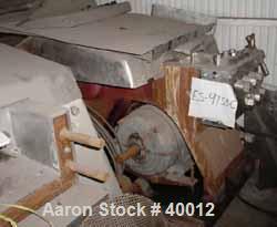 Used Gaulin Homogenizer, Model 1000MF18-5PS, Stainless Steel. Capacity 1000 gallons per hour. Missing homogenizing head assembly.  Driven by a 50 hp, 3/60/220/440 volt, 1765 rpm motor.