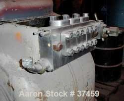 USED: Gaulin two stage industrial homogenizer, model 2000 KF24-3PS. 3000 psi max operating pressure, 850-4000 gallons per hour. Poppet valves, seat integral to cylinder, spring loaded packing. 1-7/8"...