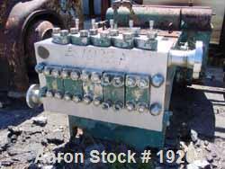 USED: Manton Gaulin pump, high pressure, 1200 psi, full stroke,fluid seal, packing adjusting screws, 304 stainless steel wettableparts, unitized on base.
