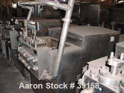 Used Cherry Burrell Homogenizer, Model SS7500-TGR-HD6. Set to operate at a flow rate of 3,000 gallons per hour at an operating pressure of 4500 psi. Stainless steel clad frame. Stainless steel head. ...