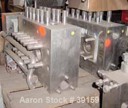 Used Cherry Burrell Model SS7500TGR-HD6 Homogenizer Cylinder Block. Stainless steel ball style valves. Requires 2-1/8" diameter plungers.