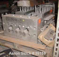 Used- Cherry Burrell Model SS7500TGR-HD6 Homogenizer Cylinder Block. Stainless steel ball style valves. Requires 2-1/8" diam...