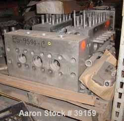 Used Cherry Burrell Model SS7500TGR-HD6 Homogenizer Cylinder Block. Stainless steel ball style valves. Requires 2-1/8" diameter plungers.