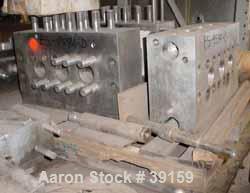 Used Cherry Burrell Model SS7500TGR-HD6 Homogenizer Cylinder Block. Stainless steel ball style valves. Requires 2-1/8" diameter plungers.