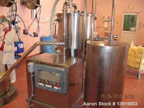 Used Fryma Koruma MZ-200/300 Homogenizer.  Total volume 79.3 gallons (300 liters), working volume 584 lbs (265 kg).  22 Hp/16.5 kW, 50 hz.  With vacuum.