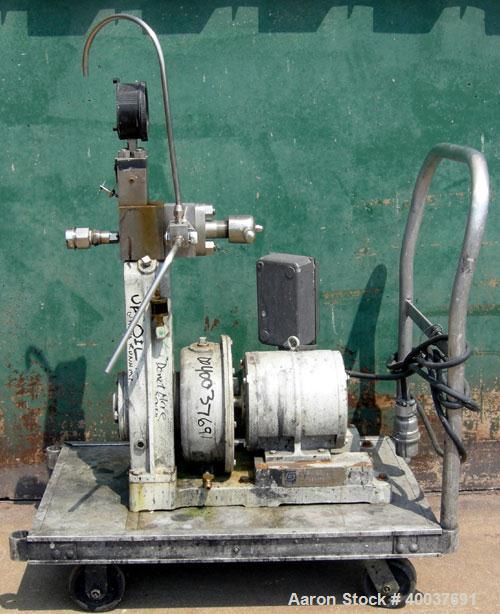 Used Gaulin Homogenizer, Model 31M3TA, 316 Stainless Steel. Approximately 31 gallons per hour, single stage valve, 3000 psi. Driven by a 3 hp, 3/60/230/460 volt, 1760 rpm motor. Mounted on a cart wit...