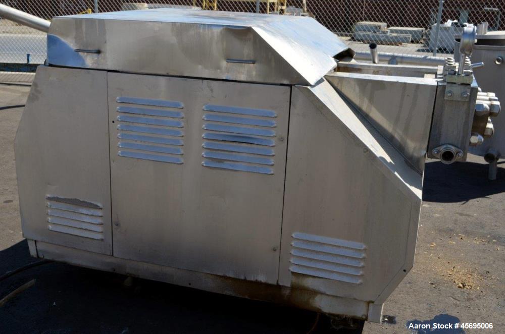 Used Gaulin Homogenizer, 304 Stainless Steel. Single stage valve assembly, 3 pistons. Driven by an approximate 50 hp motor (no tag). Head stamped with #s HT308029 & PT927857 OR. No manufactures tag w...