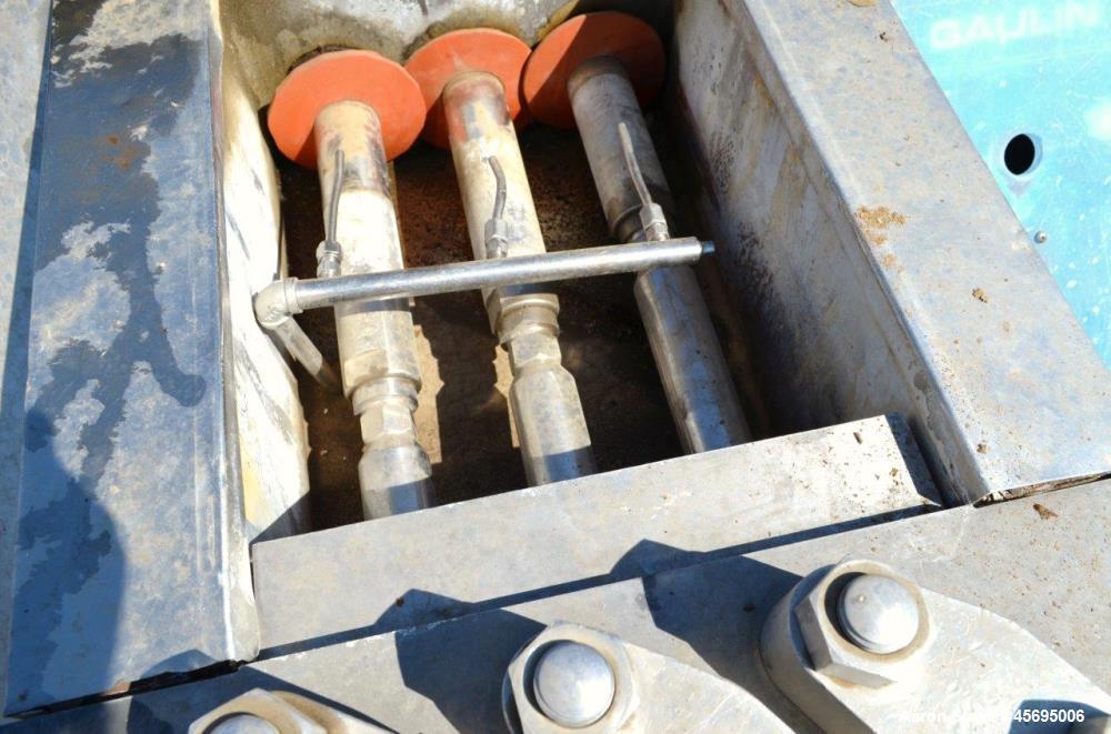 Used Gaulin Homogenizer, 304 Stainless Steel. Single stage valve assembly, 3 pistons. Driven by an approximate 50 hp motor (no tag). Head stamped with #s HT308029 & PT927857 OR. No manufactures tag w...
