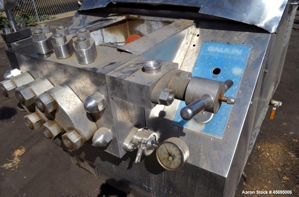 Used Gaulin Homogenizer, 304 Stainless Steel. Single stage valve assembly, 3 pistons. Driven by an approximate 50 hp motor (no tag). Head stamped with #s HT308029 & PT927857 OR. No manufactures tag w...