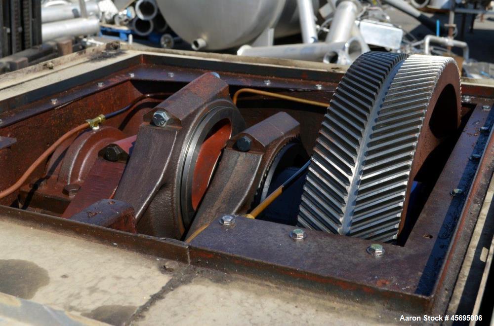 Used Gaulin Homogenizer, 304 Stainless Steel. Single stage valve assembly, 3 pistons. Driven by an approximate 50 hp motor (no tag). Head stamped with #s HT308029 & PT927857 OR. No manufactures tag w...