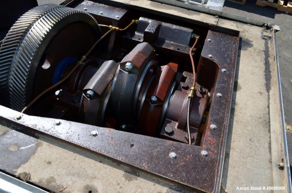 Used Gaulin Homogenizer, 304 Stainless Steel. Single stage valve assembly, 3 pistons. Driven by an approximate 50 hp motor (no tag). Head stamped with #s HT308029 & PT927857 OR. No manufactures tag w...
