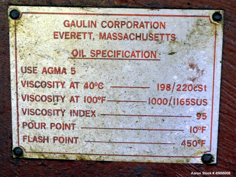 Used Gaulin Homogenizer, 304 Stainless Steel. Single stage valve assembly, 3 pistons. Driven by an approximate 50 hp motor (no tag). Head stamped with #s HT308029 & PT927857 OR. No manufactures tag w...
