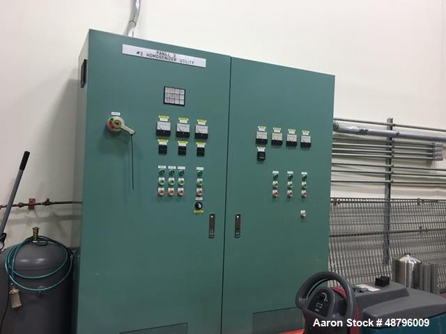 Used Mizuho Homogenizer, Model VT-1-1000. 1000 liter capacity. Includes: 3hp paddle mixer, 7.5hp scraping mixer, 30hp ultra mixer, 7.5hp oil hydraulic pump, 2hp tilting motor. 3 Phase, 480V, 60 Hz.