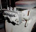 USED: Gaulin two stage industrial homogenizer, model 2000 KF24-3PS. 3000 psi max operating pressure, 850-4000 gallons per hour. Poppet valves, seat integral to cylinder, spring loaded packing. 1-7/8