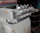 USED: Gaulin two stage industrial homogenizer, model 2000 KF24-3PS. 3000 psi max operating pressure, 850-4000 gallons per hour. Poppet valves, seat integral to cylinder, spring loaded packing. 1-7/8
