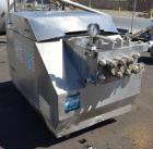 Used Gaulin Homogenizer, 304 Stainless Steel. Single stage valve assembly, 3 pistons. Driven by an approximate 50 hp motor (no tag). Head stamped with #s HT308029 & PT927857 OR. No manufactures tag w...