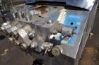 Used Gaulin Homogenizer, 304 Stainless Steel. Single stage valve assembly, 3 pistons. Driven by an approximate 50 hp motor (no tag). Head stamped with #s HT308029 & PT927857 OR. No manufactures tag w...