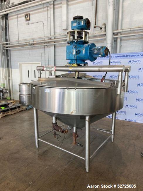 Used APV Crepaco Cooker / Kettle, Approximate 400 Gallon, Stainless Steel, Vertical. Flat top, coned bottom. Jacket rated 75 psi to -20 to 350 degrees F. Stainless steel agitator bridge. Center botto...