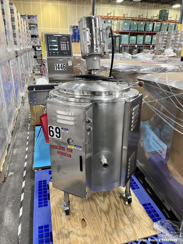Used Groen electrically heated stainless steel kettle. approximately 50 gallons with top agitator drive.