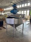 Used APV Crepaco Cooker / Kettle, Approximate 400 Gallon, Stainless Steel, Vertical. Flat top, coned bottom. Jacket rated 75 psi to -20 to 350 degrees F. Stainless steel agitator bridge. Center botto...