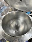 Used Groen electrically heated stainless steel kettle. approximately 50 gallons with top agitator drive.