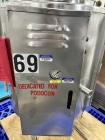 Used Groen electrically heated stainless steel kettle. approximately 50 gallons with top agitator drive.