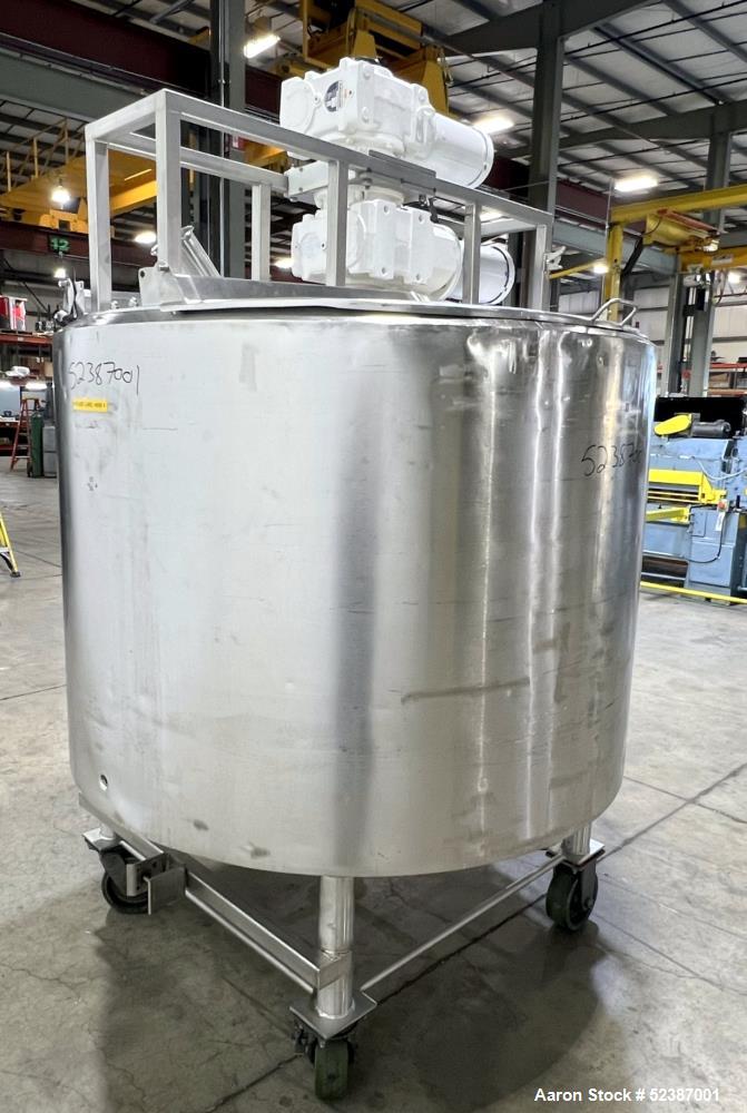 Used Crepaco Jacketed Mix Kettle, Stainless Steel, Model B, Approximately 500 Gallons. Flat top with agitator bridge and (2) 1/3 hinged covers, slight coned bottom. Approximately 60" diameter x 42" s...
