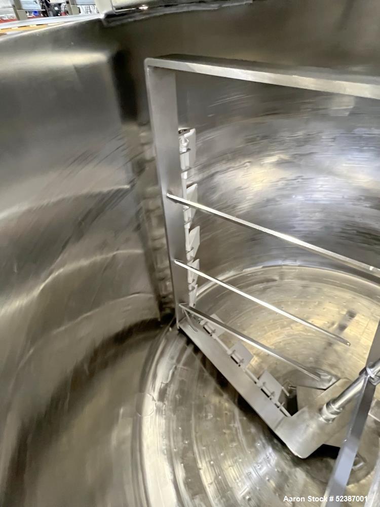 Used Crepaco Jacketed Mix Kettle, Stainless Steel, Model B, Approximately 500 Gallons. Flat top with agitator bridge and (2) 1/3 hinged covers, slight coned bottom. Approximately 60" diameter x 42" s...
