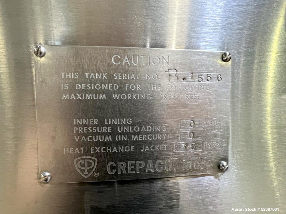 Used Crepaco Jacketed Mix Kettle, Stainless Steel, Model B, Approximately 500 Gallons. Flat top with agitator bridge and (2) 1/3 hinged covers, slight coned bottom. Approximately 60" diameter x 42" s...