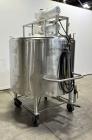 Used Crepaco Jacketed Mix Kettle, Stainless Steel, Model B, Approximately 500 Gallons. Flat top with agitator bridge and (2) 1/3 hinged covers, slight coned bottom. Approximately 60