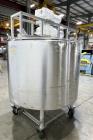 Used Crepaco Jacketed Mix Kettle, Stainless Steel, Model B, Approximately 500 Gallons. Flat top with agitator bridge and (2) 1/3 hinged covers, slight coned bottom. Approximately 60