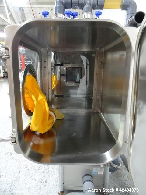 Used IsoTech Design Isolator, Model 150PROTECT. Stainless steel construction, 48" wide x 30" deep x 28" high chamber, single sided, (3) gloves, 20" x 20" x 24" long anti chamber with glove, end mount...