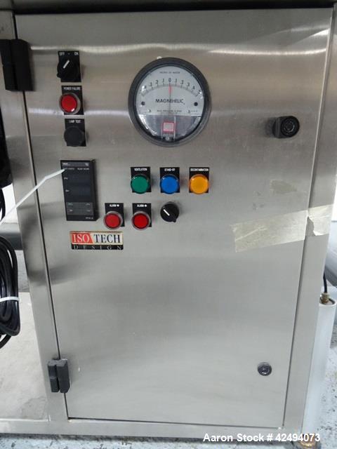 Used IsoTech Design Isolator, Model 150PROTECT. Stainless steel construction, 48" wide x 30" deep x 28" high chamber, single sided, (3) gloves, 20" x 20" x 24" long anti chamber with glove, end mount...