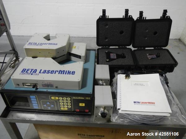 Used Beta Laser Mike, controller model 182-300, serial# 98-2862, with model 201-100, range from .25-25mm, +/- .006%, serial# 98-129 mike, model 202-200, range from .36-50.8mm, +/- .004%, serial# 98-0...