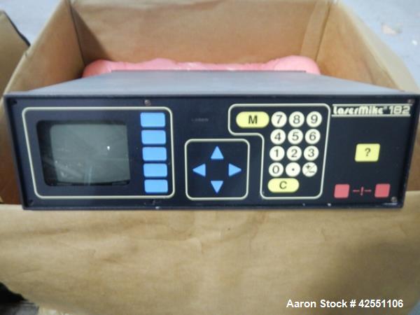 Used Beta Laser Mike, controller model 182-300, serial# 98-2862, with model 201-100, range from .25-25mm, +/- .006%, serial# 98-129 mike, model 202-200, range from .36-50.8mm, +/- .004%, serial# 98-0...