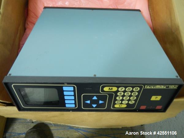 Used Beta Laser Mike, controller model 182-300, serial# 98-2862, with model 201-100, range from .25-25mm, +/- .006%, serial# 98-129 mike, model 202-200, range from .36-50.8mm, +/- .004%, serial# 98-0...