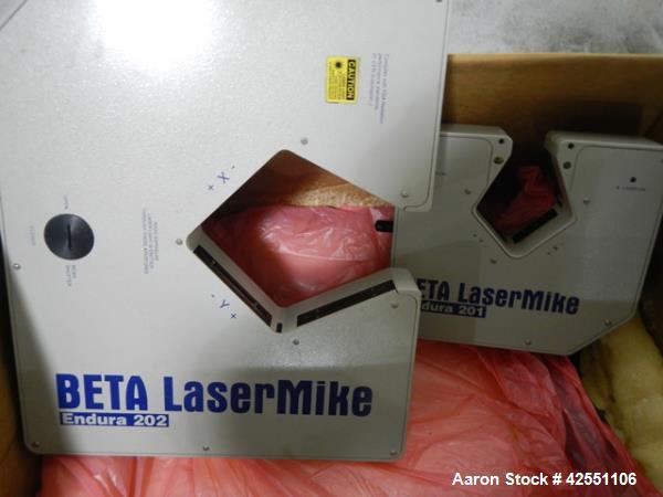 Used Beta Laser Mike, controller model 182-300, serial# 98-2862, with model 201-100, range from .25-25mm, +/- .006%, serial# 98-129 mike, model 202-200, range from .36-50.8mm, +/- .004%, serial# 98-0...