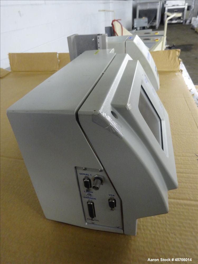 Used Beta Lasermike, Model # 283-10. Bench top laser non-contact measuring device. 130/230 VAC, .75 amp, 50/60Hz. Last calibrated on Jan. 2013. Serial # 38-01-1007.