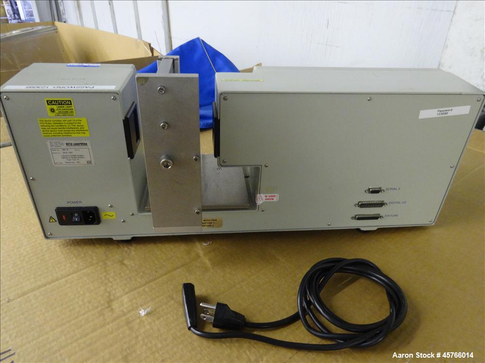 Used Beta Lasermike, Model # 283-10. Bench top laser non-contact measuring device. 130/230 VAC, .75 amp, 50/60Hz. Last calibrated on Jan. 2013. Serial # 38-01-1007.