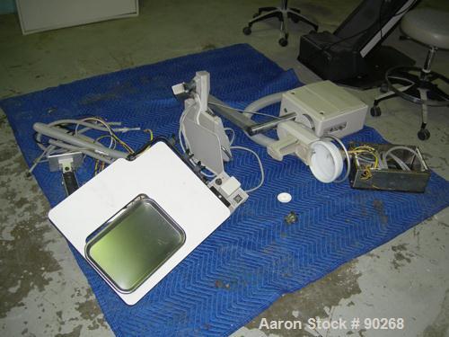USED: A-Dec dental chair, model 1005. Foot pedal controls, wall mount delivery system with light and cuspidor. Includes doctor and assistant stools.