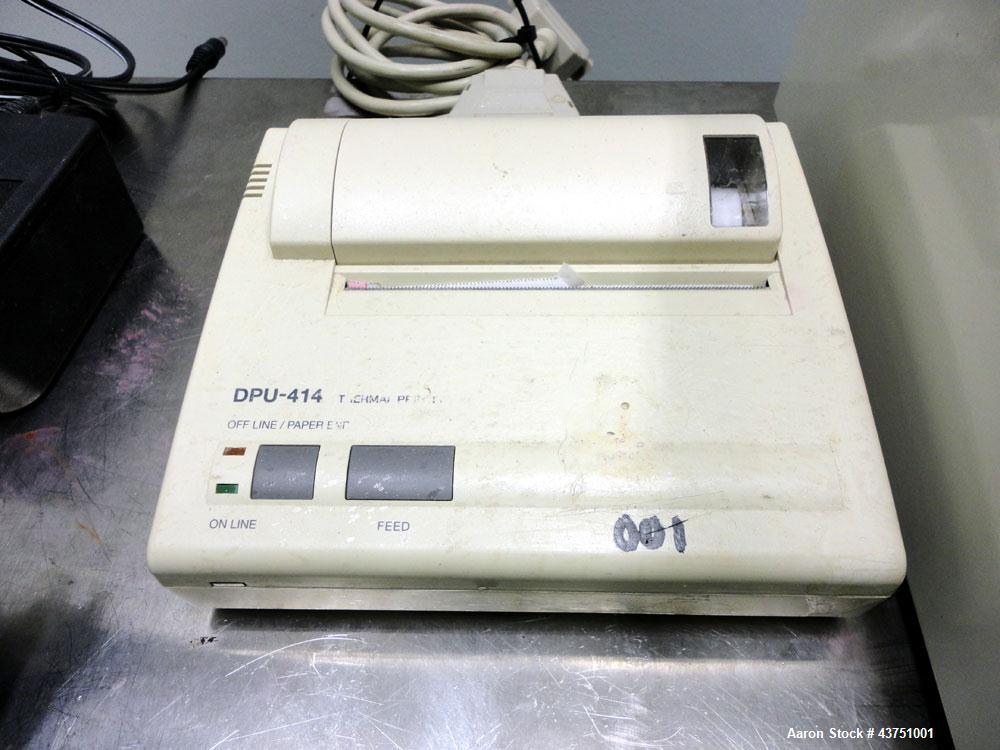 Used Buchi Melting Point Instrument, Model B-545. Designed to detect the melting and boiling points of a wide range of substances. Includes a key board and model DPU-414 printer.