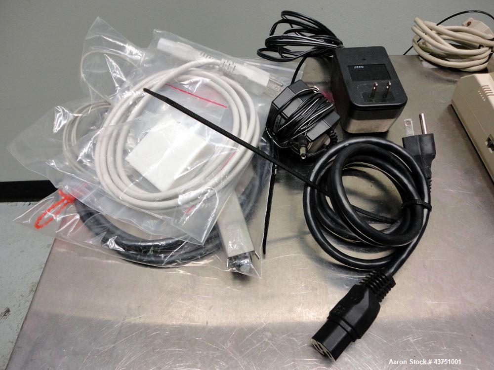 Used Buchi Melting Point Instrument, Model B-545. Designed to detect the melting and boiling points of a wide range of substances. Includes a key board and model DPU-414 printer.