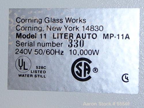 USED: Corning Glass Works Mega-Pure automatic water distillation unit, model MP-11A, glass construction. Production volume 13 liters per hour, cooling water capacity 130 liters per hour. (4) heaters,...